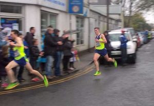 Tom Marshall and Ieuan Thomas elite runners of Team Thie race in Cardiff over a road 5k